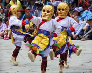 Skull mask dancers